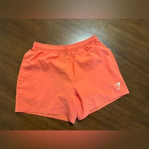 Gymshark Arrival 5” Orange Athletic Shorts